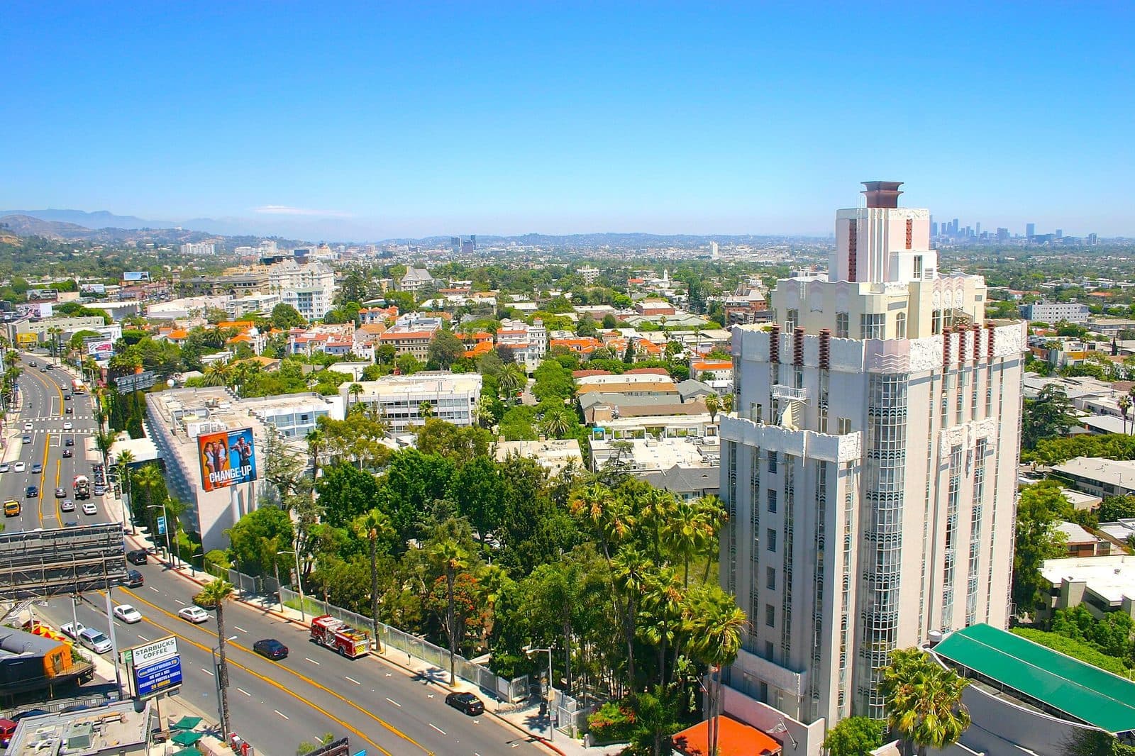 Sunset Tower Hotel rising above Sunset Boulevard, with Los Angeles beyond